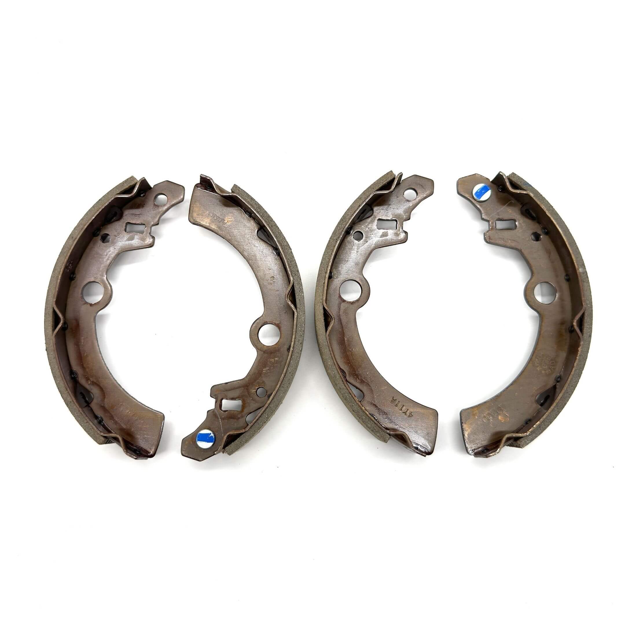 Brake Shoes - Right & Left for Subaru Sambar Truck TT1, TT2 Models (1999-2012), featuring durable brown metal construction.