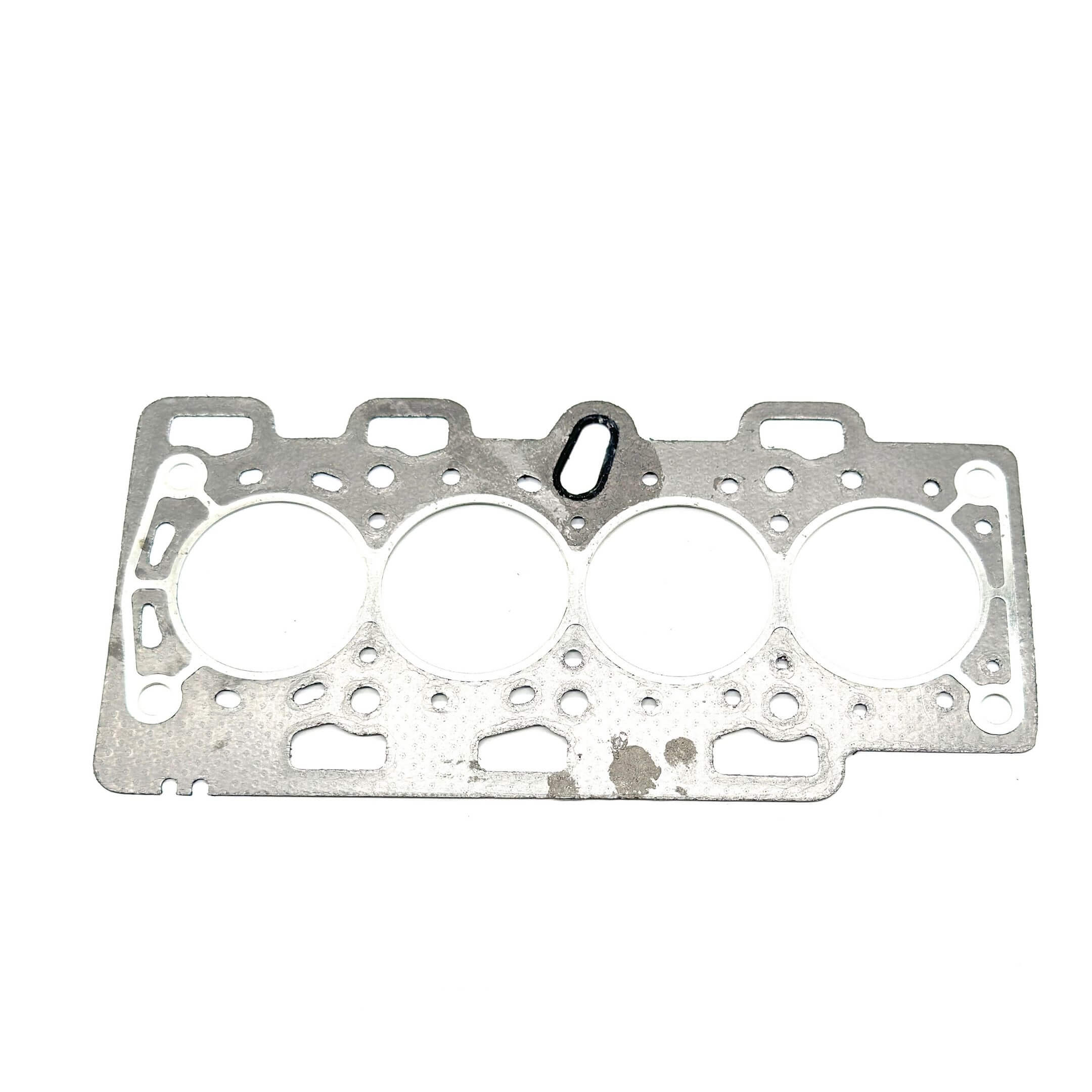 Cylinder Head Gasket for Subaru Sambar Wagon TW1, TW2 Models (2003-2012), silver, featuring multiple circular cutouts and durable construction.