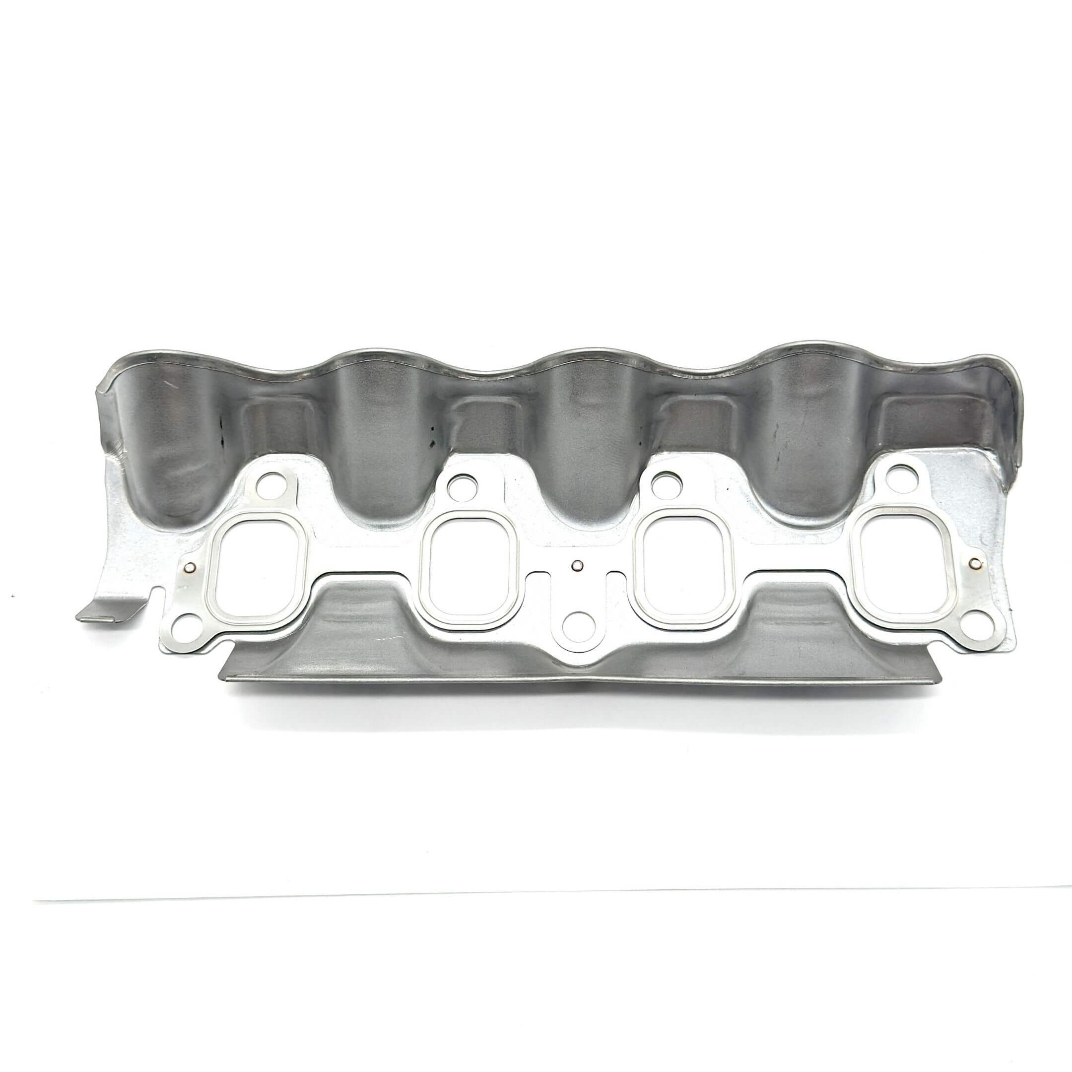 Exhaust Manifold Gasket for Subaru Sambar Van TV1, TV2 Models 1999-2012, featuring a durable metal construction with a wavy design.
