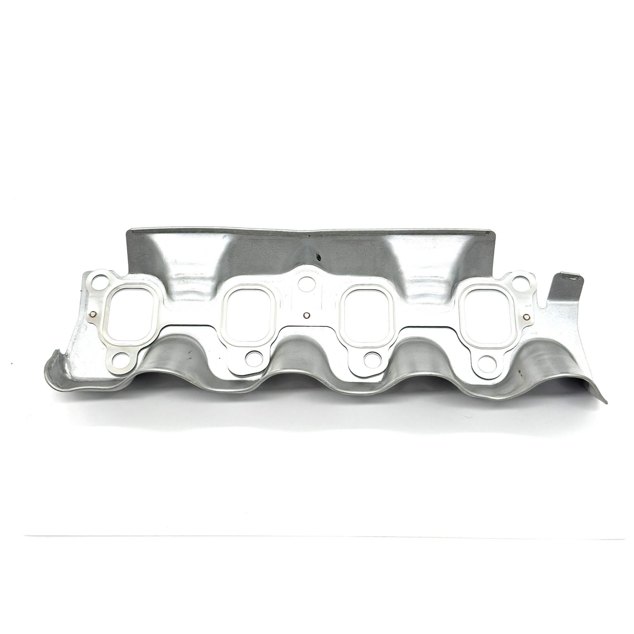 Exhaust Manifold Gasket for Subaru Sambar Van TV1, TV2 Models (1999-2012), featuring a durable silver metal design with multiple bolt holes.