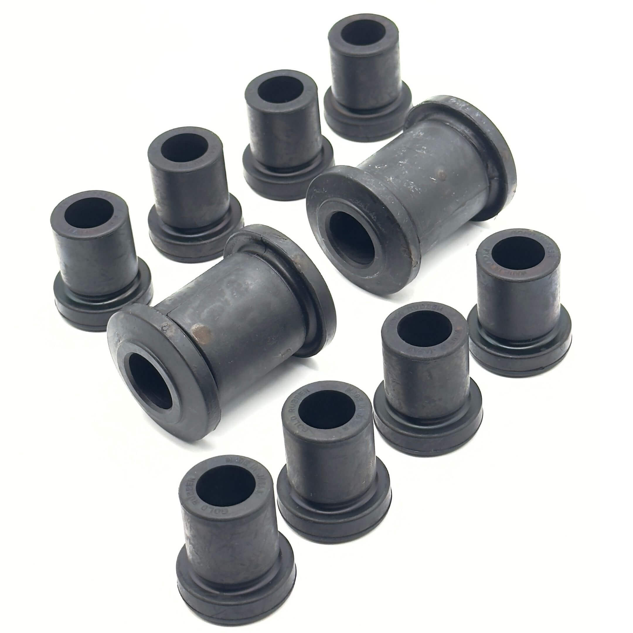Leaf Spring Bushing Kit for Honda Acty Van Models HH3, HH4 (1990-1999), featuring durable black rubber components for front and rear suspension.