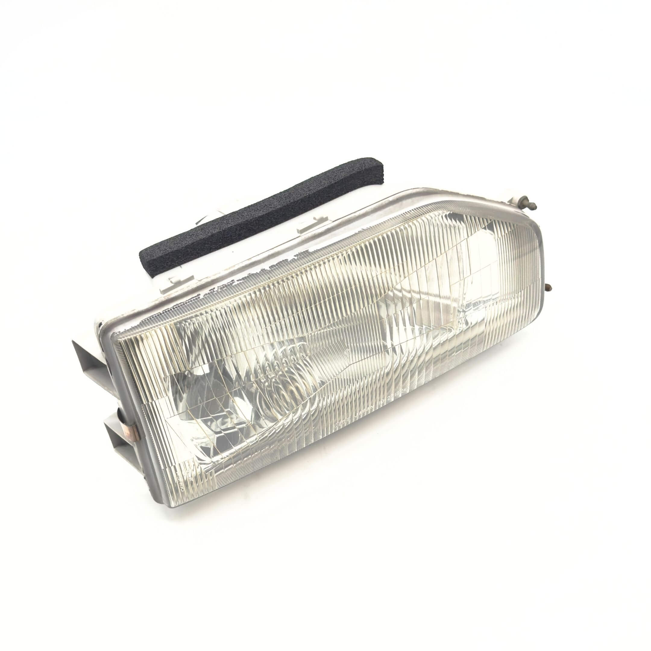 Headlight for Honda Acty Truck HA3, HA4 (1990-1993) featuring a clear lens and durable construction for the right driver side.