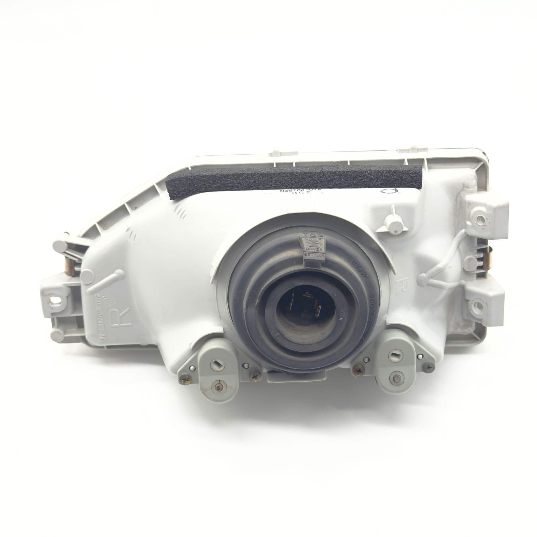 Headlight for Honda Acty Truck Models HA3, HA4 (1990-1993) featuring a right-side driver design with durable housing and mounting components.