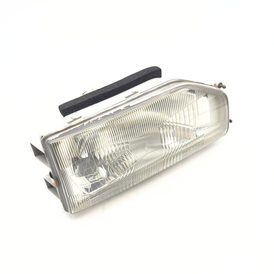 Headlight for Honda Acty Van Models HH3, HH4 (1990-1993) featuring a clear lens and durable housing, right/driver side.