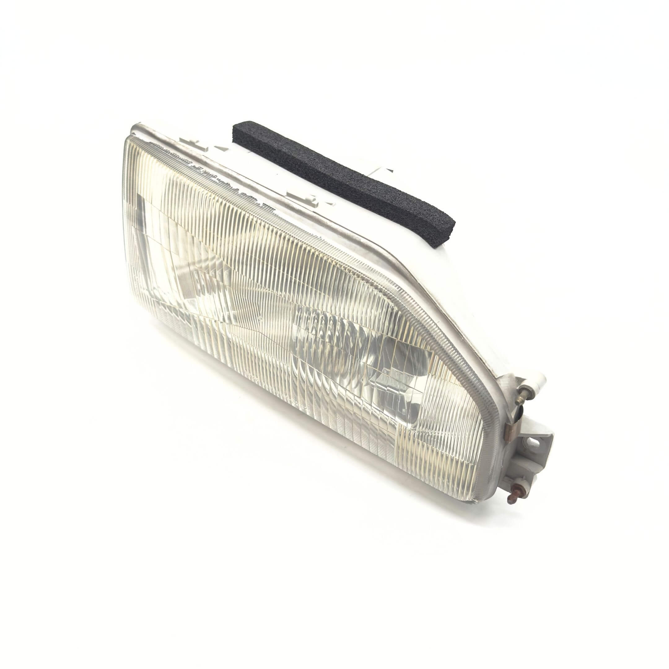 Headlight for Honda Acty Van Models HH3, HH4 (1990-1993) featuring a clear lens and durable housing for the right driver side.