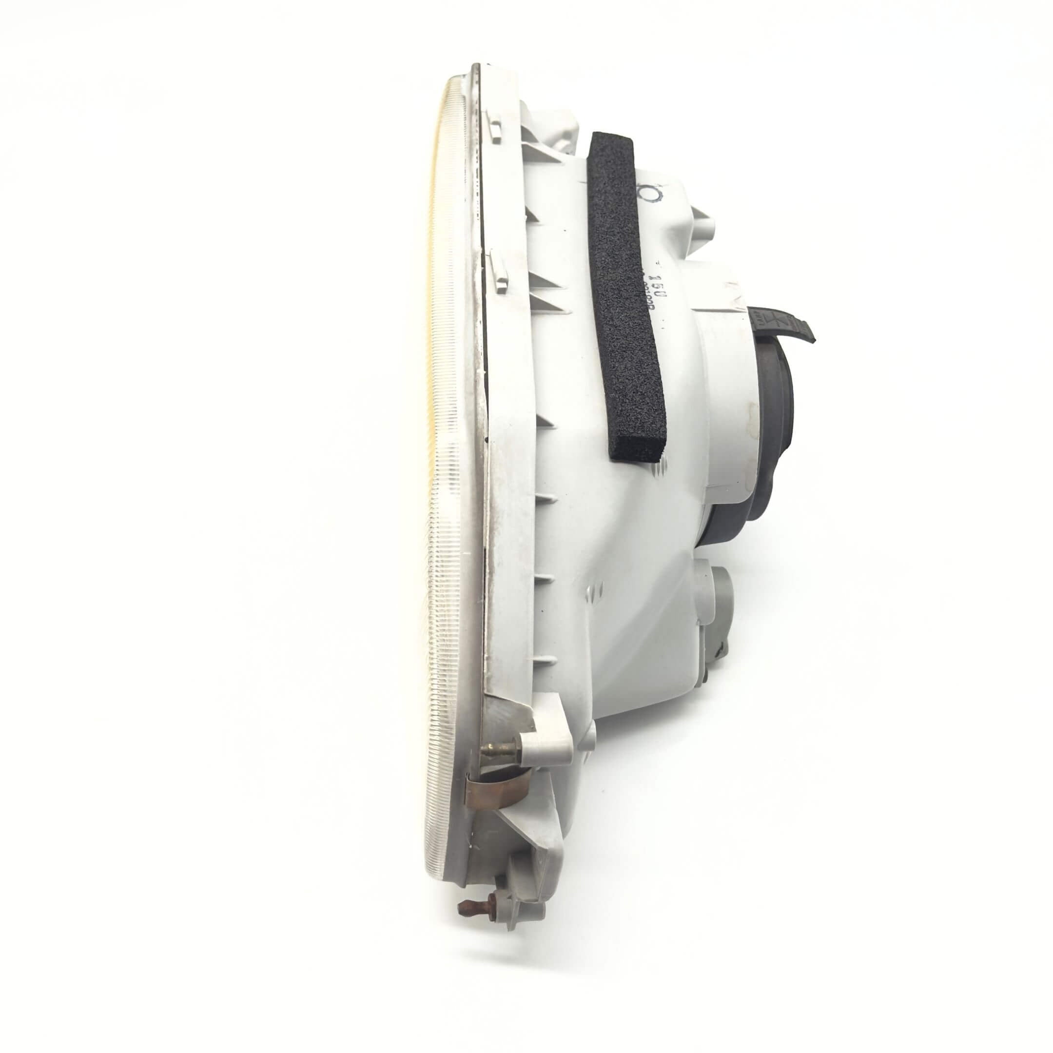 Headlight for Honda Acty Van Models HH3, HH4 (1990-1993) featuring a durable housing and clear lens design.