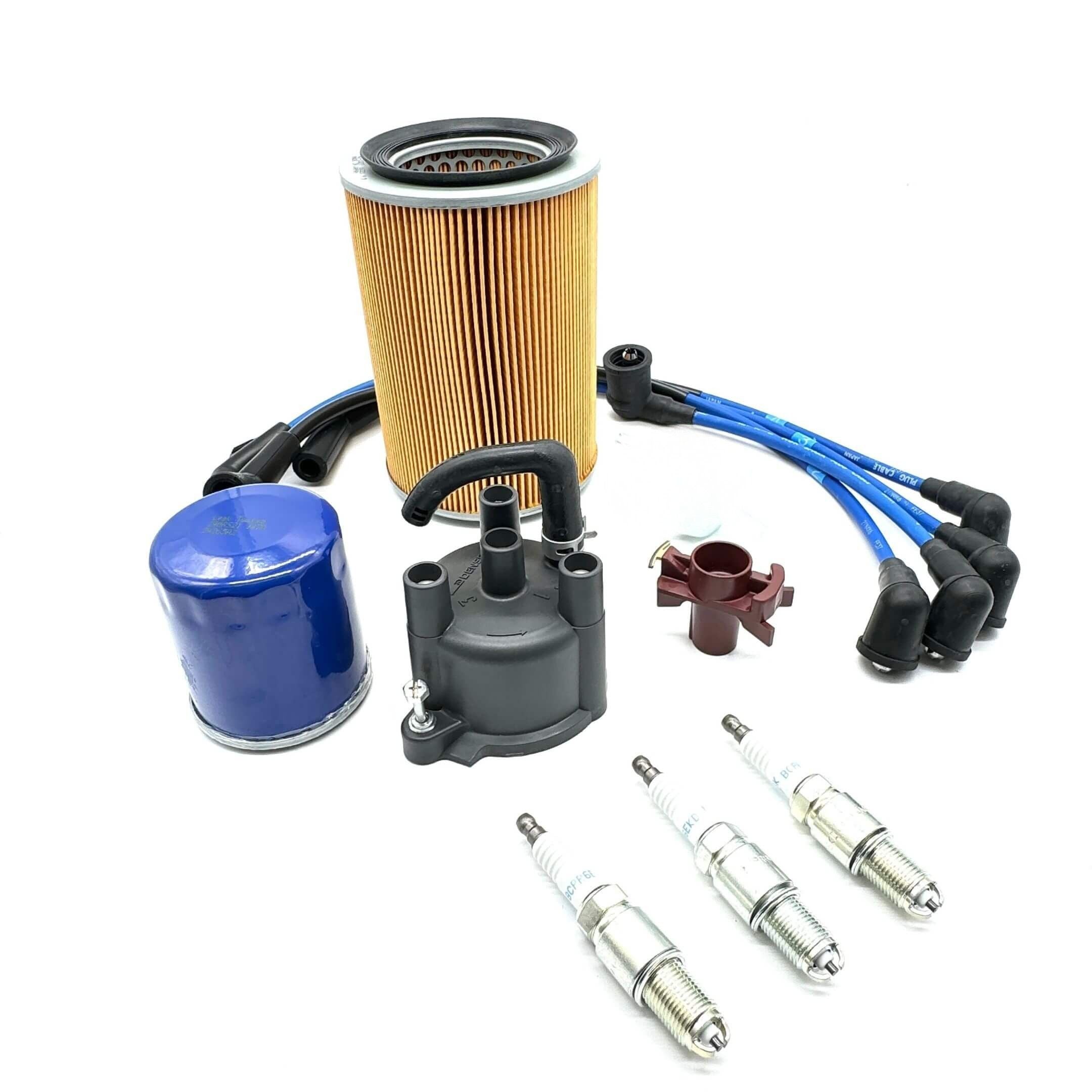 Complete EFI ignition tune-up kit for Daihatsu Hijet S100P/S110P—cap, rotor, plugs, wires, air filter, oil filter.