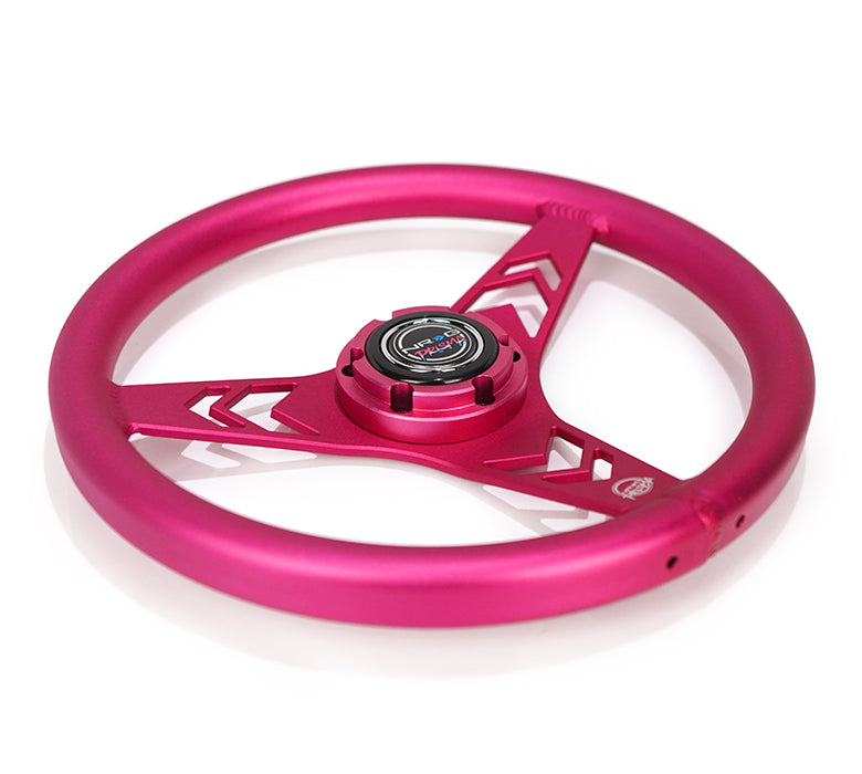 Ergonomic grip steering wheel in radiant pink.