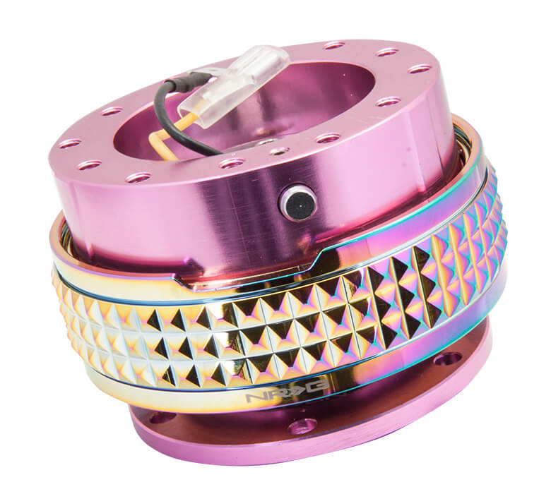 Close-up of the NRG Quick Release Kit - Pink Body / Neochrome Pyramid Ring - 2.1 Pyramid Series - SRK-210PK-MC, highlighting the vibrant pink color and detailed neochrome pyramid pattern.