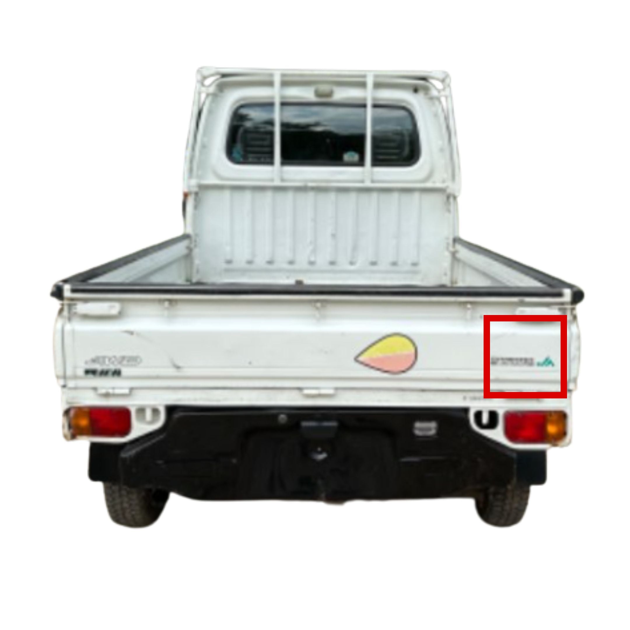 Rear view of a white Subaru Sambar kei truck with an open bed. The tailgate displays a "Sambar Subaru JA" decal on the right side highlighted in red, along with a colorful circular decal in the center and 4WD branding on the left side.