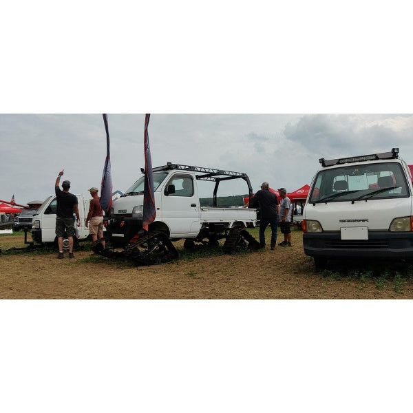 Suzuki Carry Rack Ladder Roof Rack for DB52T Model 1999-2002, featuring a durable black metal frame, showcased on a white mini truck.