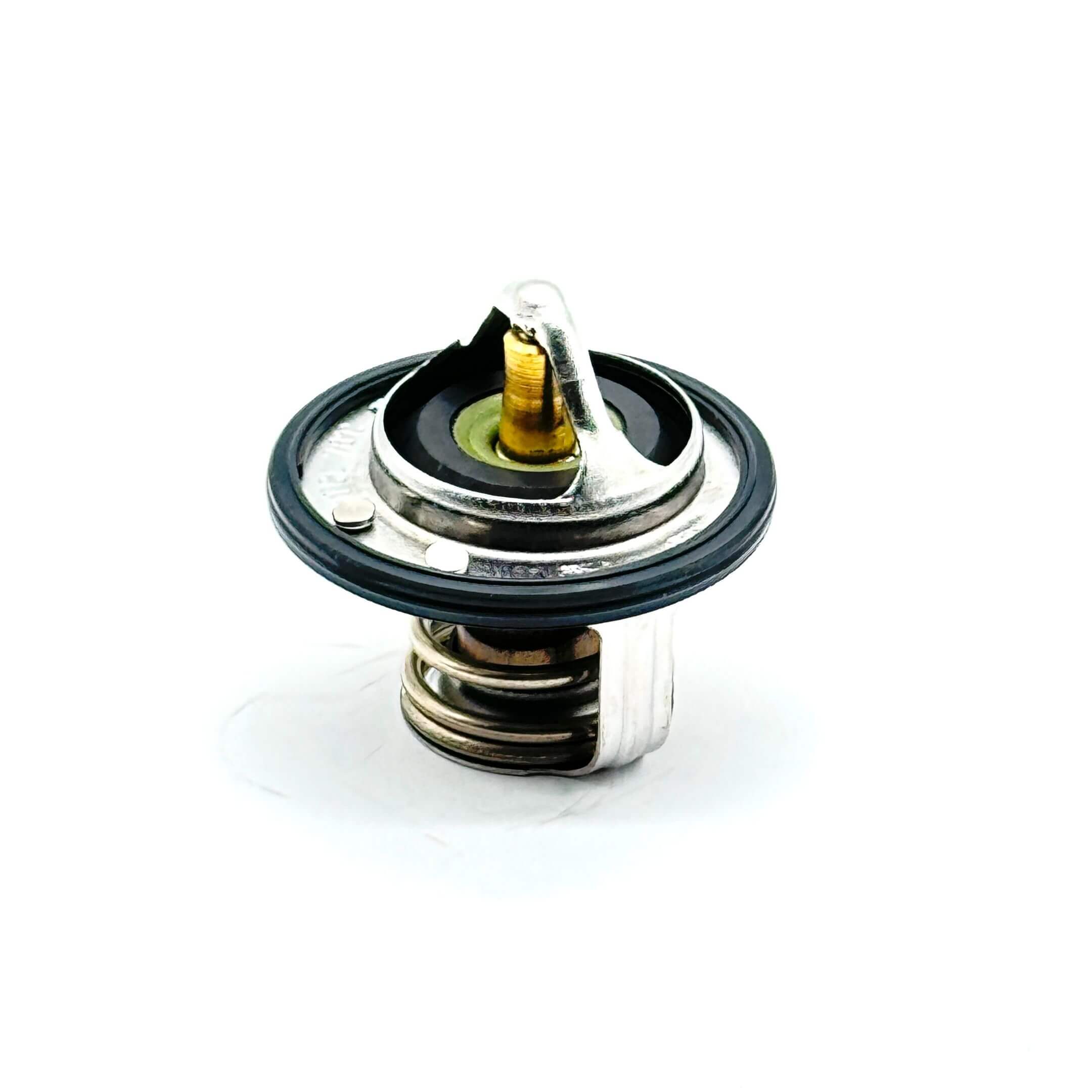 Thermostat for Subaru Sambar Truck TT1, TT2 Models 1999-2012, genuine part with metallic finish and durable construction.