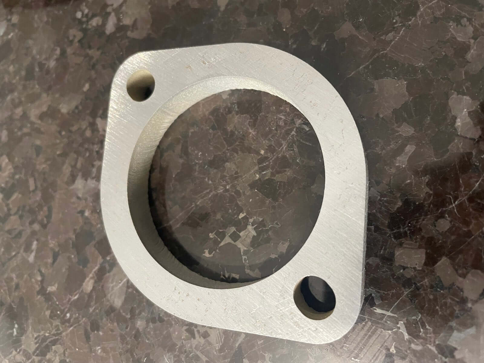 Durable 3/8 mild steel exhaust flange for Honda Acty HH3 HH4, waterjet cut to precise OEM specs for a 1990-1999 perfect fit upgrade.