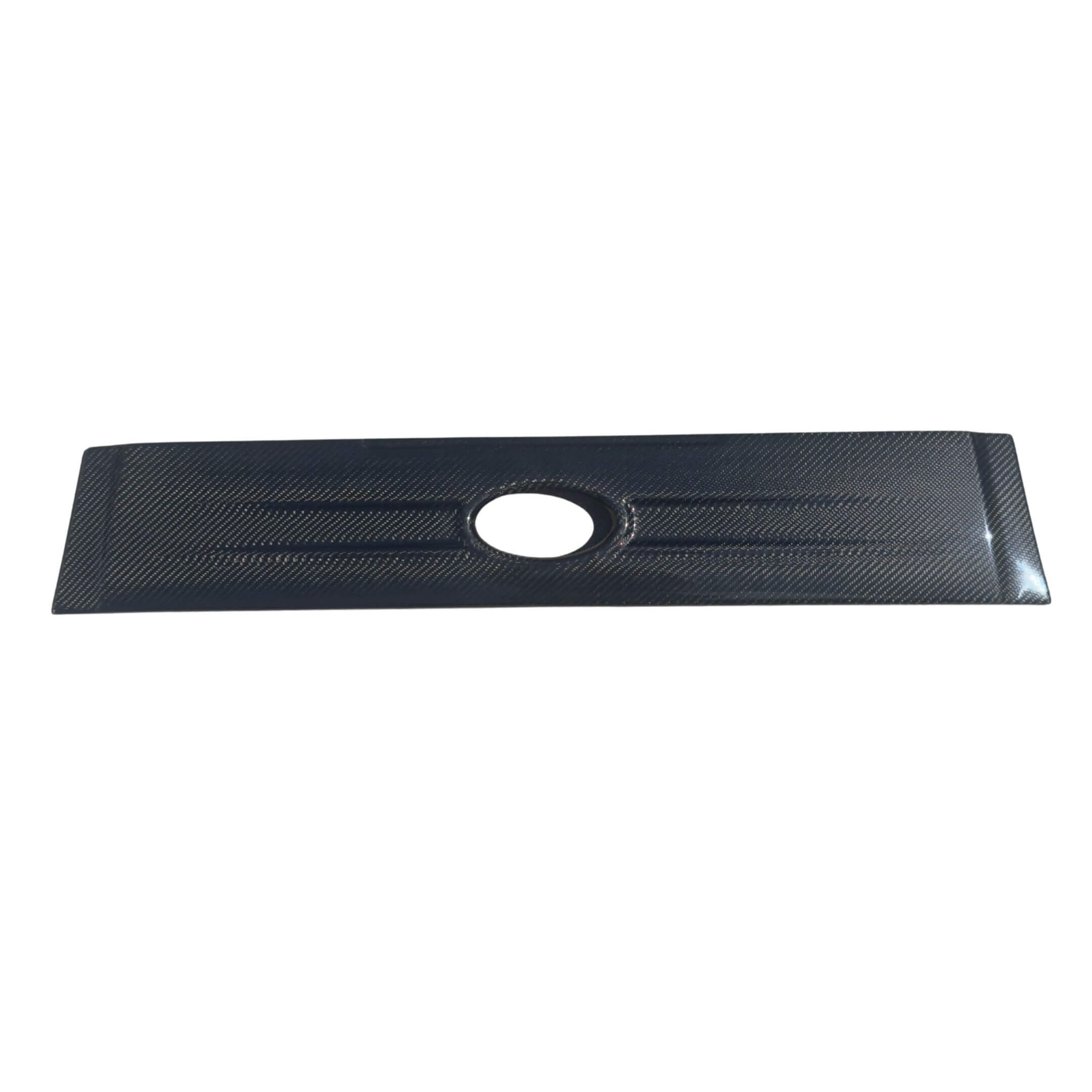 Carbon Fiber Grill Cover by Zero Auto for Subaru Sambar Truck TT1, TT2 Models (2005-2009) featuring a sleek design with a central circular cutout.