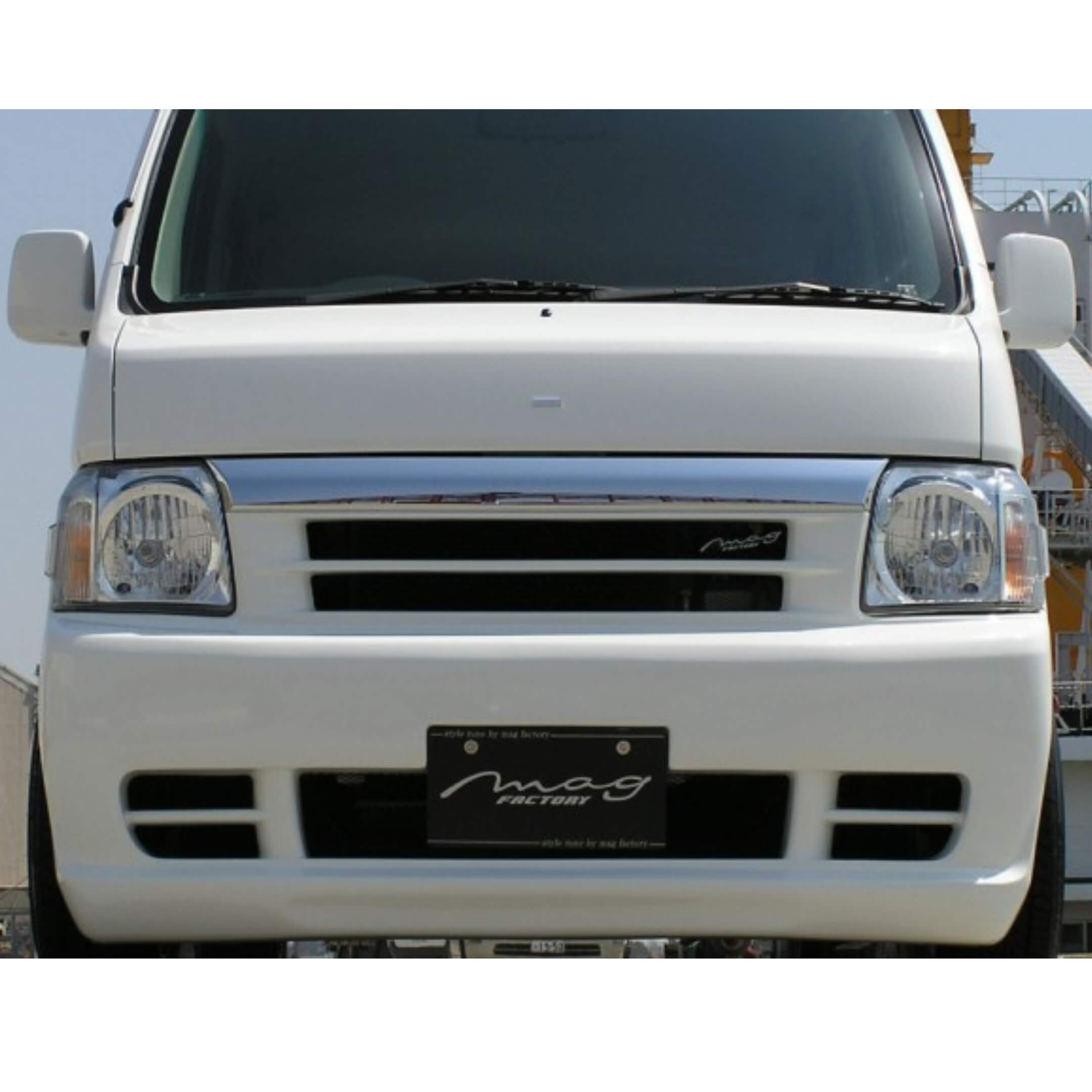 White Honda Vamos front bumper body kit for HM1, HM2 models, 1999-2018, featuring a sleek design with integrated grille and headlight cutouts.