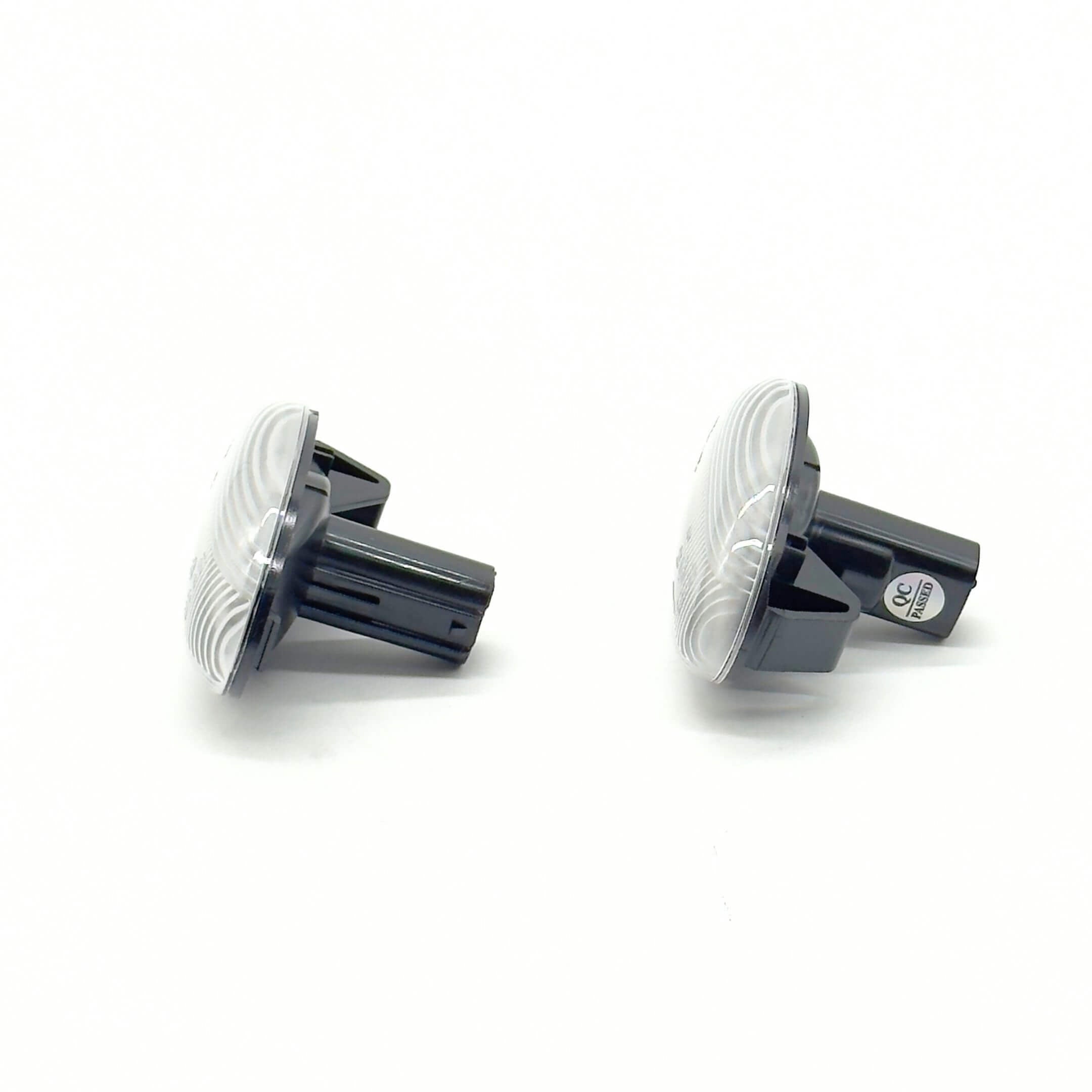 Flowing Turn Signals with Sequential LED Side Markers for Subaru Sambar Truck TT1, TT2 Models (2002-2012) featuring sleek black housing and clear lenses.