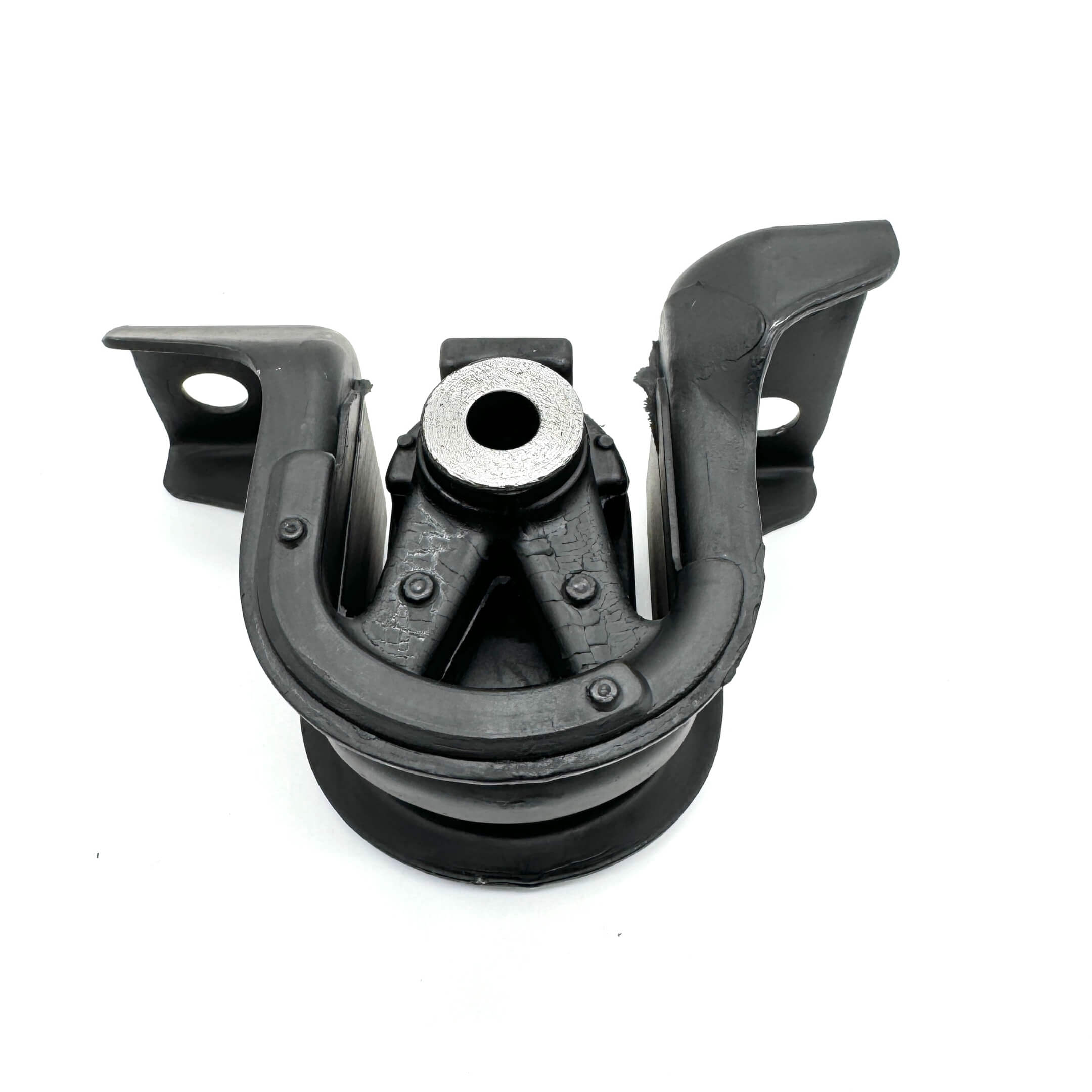 Rear engine mount for Honda Acty Truck, black rubber and metal, top view, features curved design and mounting brackets