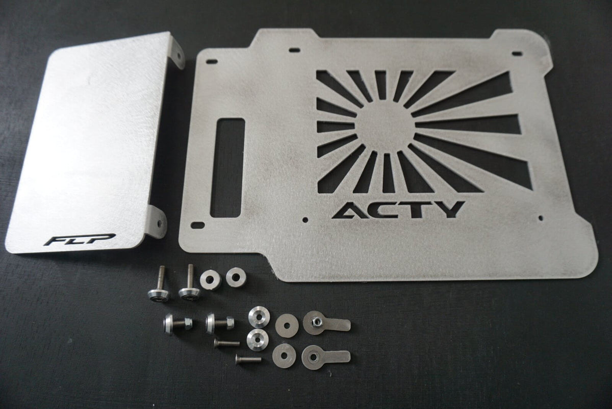 Rising Sun Battery Cover for Honda Acty Truck, featuring a silver metal design with cut-out sun rays and logo, includes mounting hardware