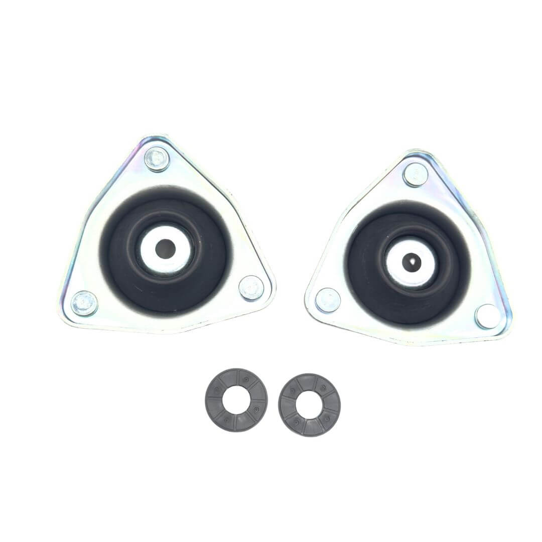 Angle view of the Honda Acty Truck HA8, HA9 front suspension strut mounts 51920-S3A-014 (GMHO-10010), showing the mount bodies and bearing seats.