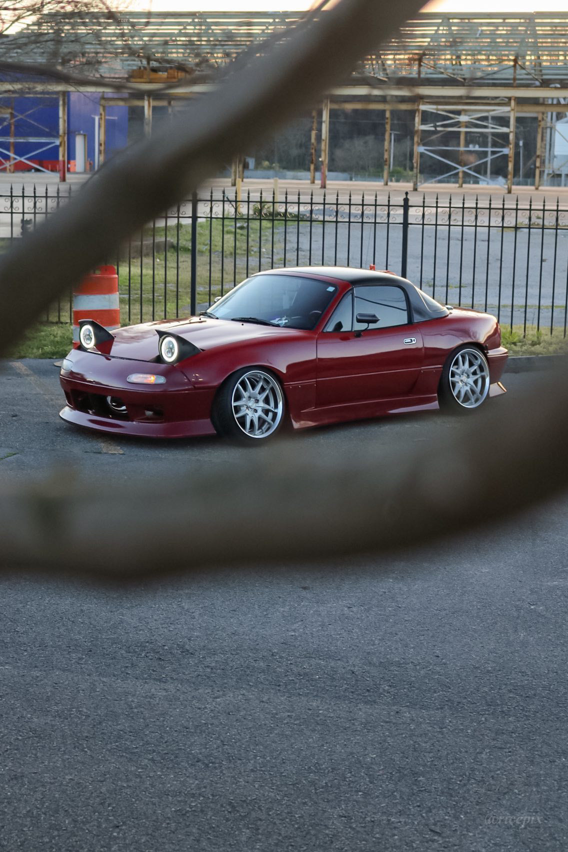 Mazda Miata with Nebula Black tint, highlighting a glossy, reflective black surface.