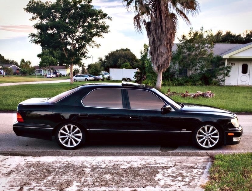 Sports Car with Omnique Rhyolite Bronze Window Tint – Classy Bronze Finish