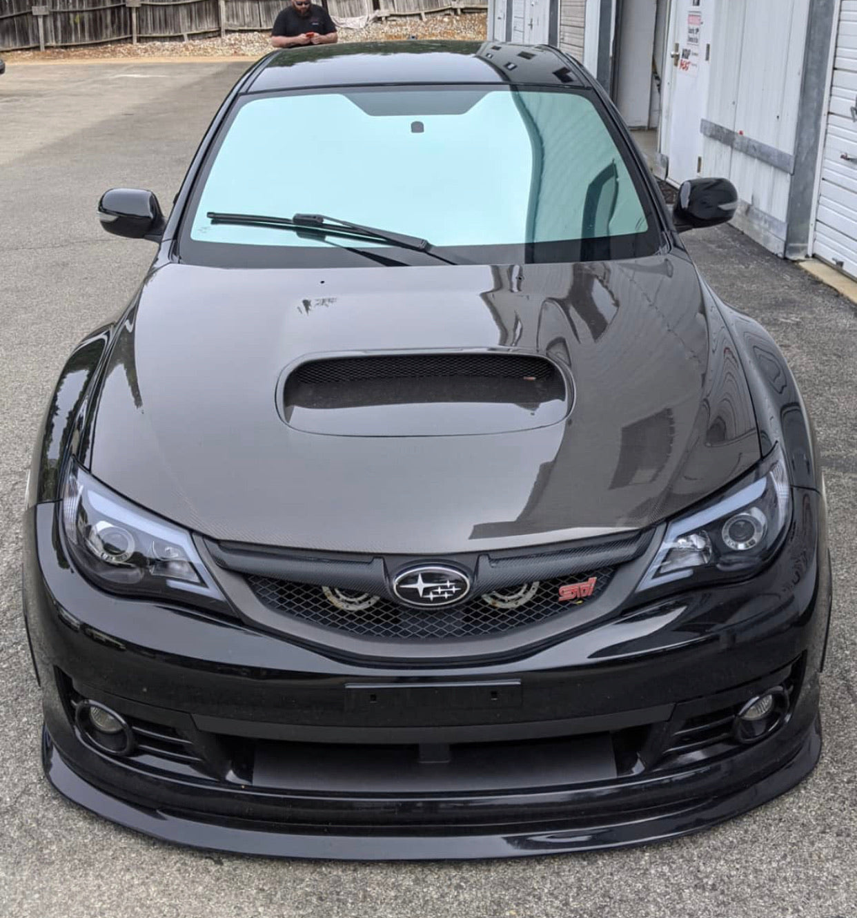 Black Subaru with Neo Silver tint applied, featuring a full mirror finish and clear view from inside.