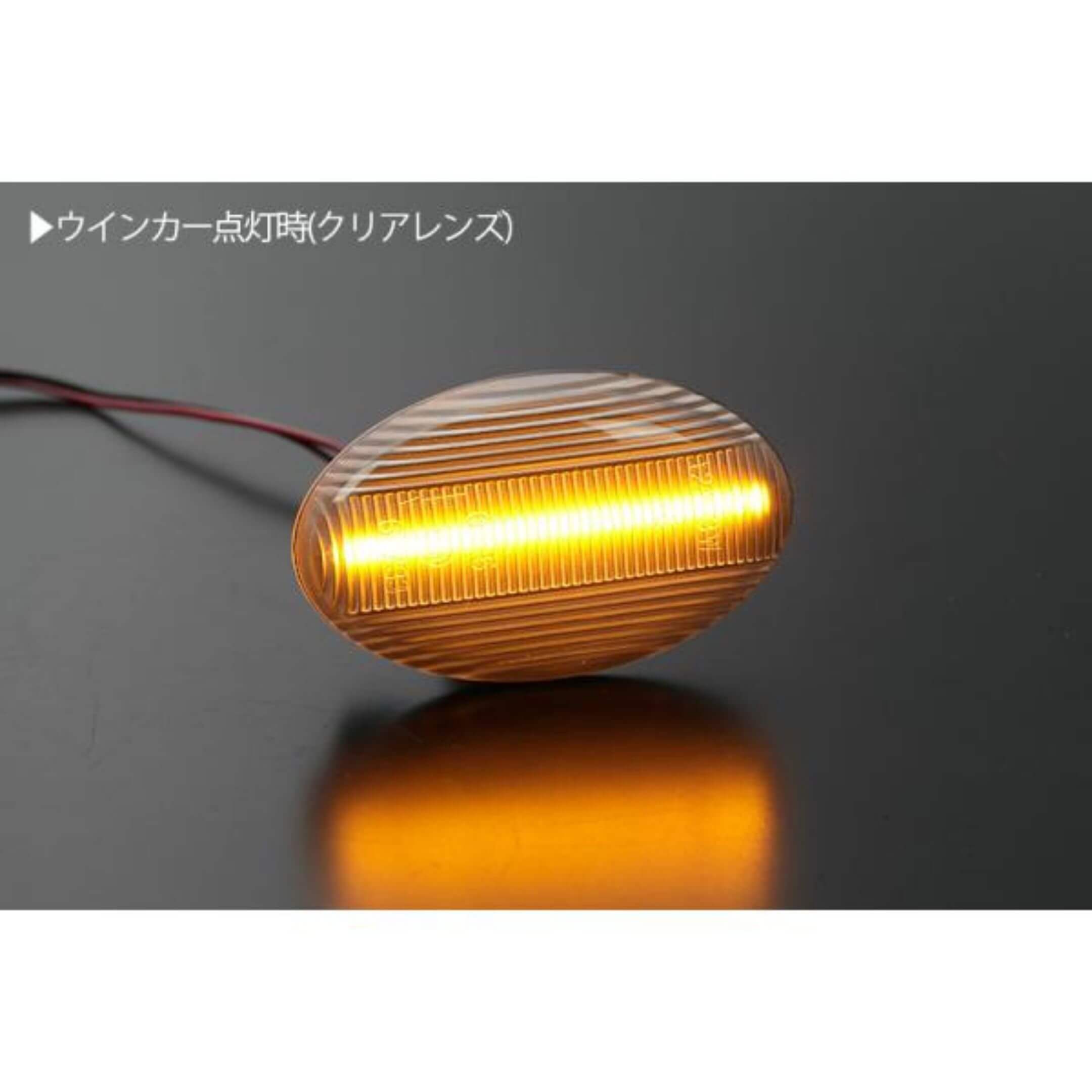 Flowing Turn Signals with Sequential LED Side Markers for Subaru Sambar Truck TT1, TT2 Models (2002-2012) featuring a clear lens and bright amber illumination.