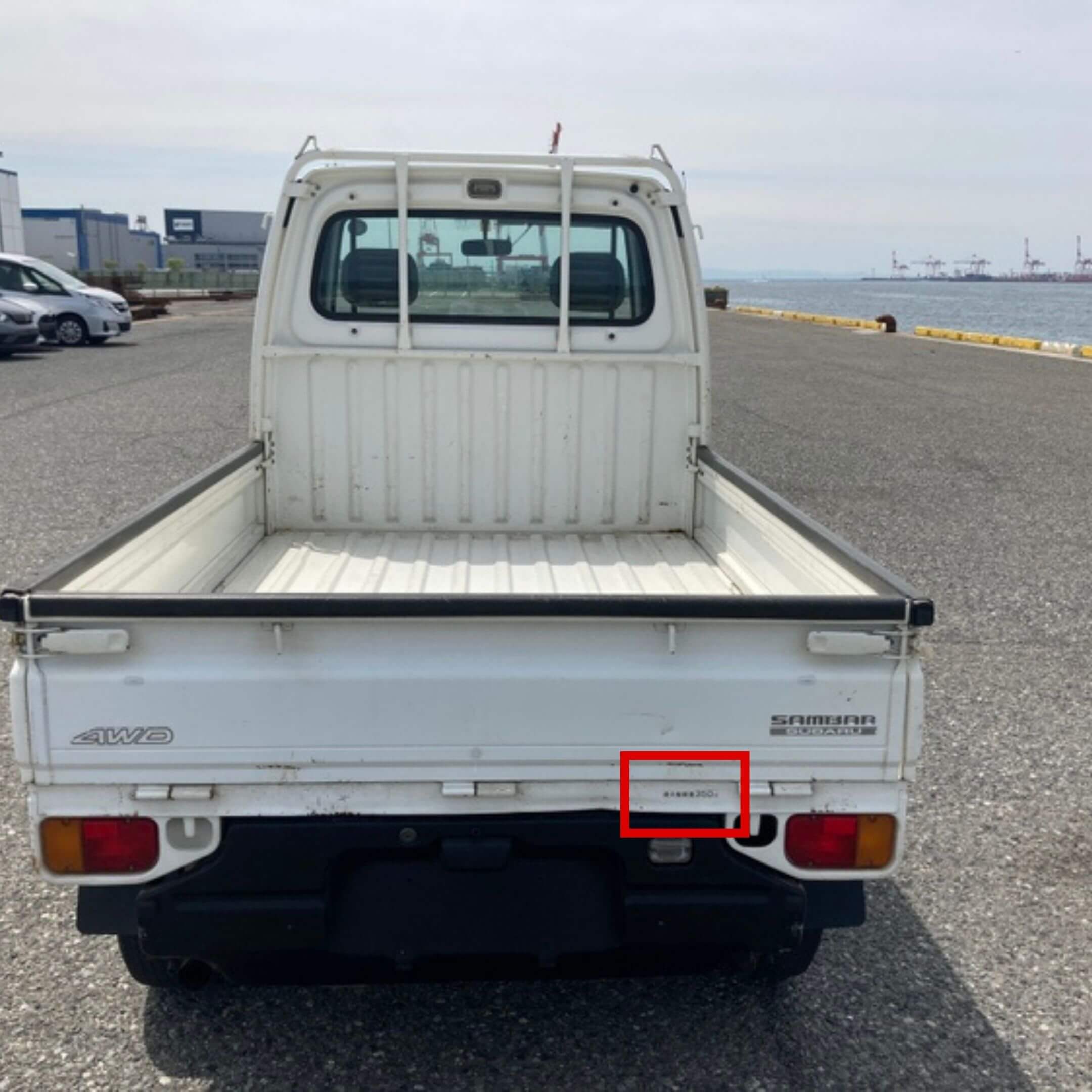 350 kg Load Capacity Decal on the rear tailgate of a Subaru Sambar Truck TT1, TT2 models from 1999-2012, showcasing its load capacity feature.