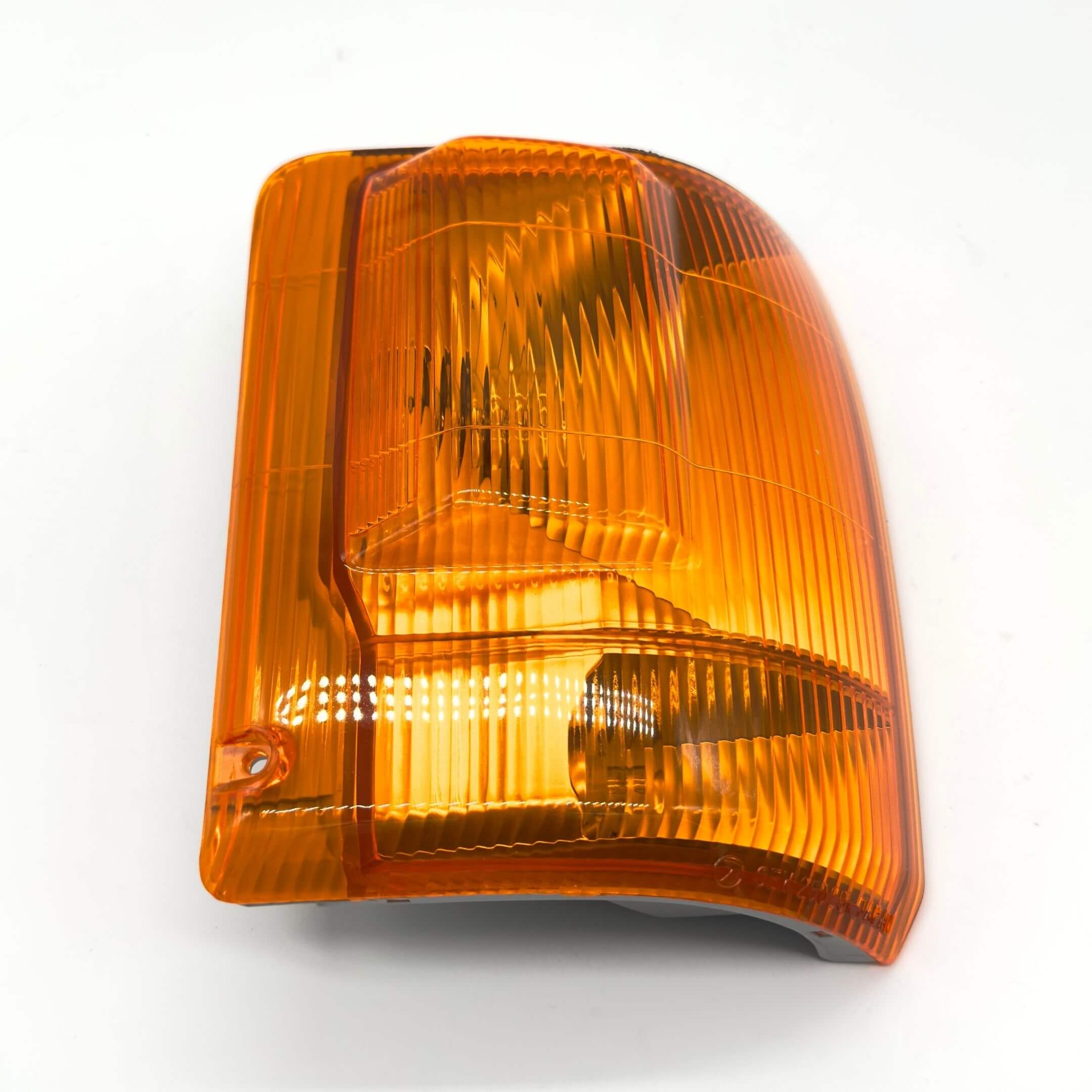 Front Turn Lamp Assembly - Right / Driver Side for Subaru Sambar Wagon TW1, TW2 Models (1999-2012) featuring an amber lens with a textured design.
