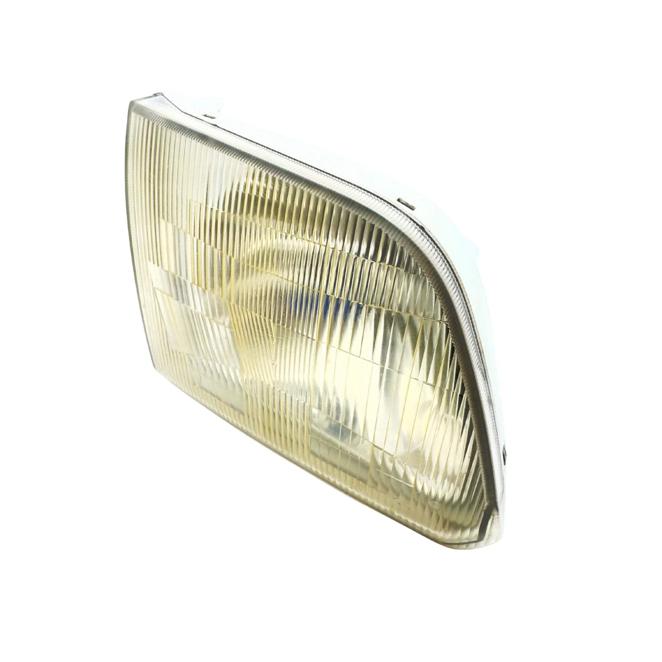 Used right driver side headlight for Subaru Sambar Truck TT1, TT2 models (2002-2012) featuring a clear lens and durable housing.
