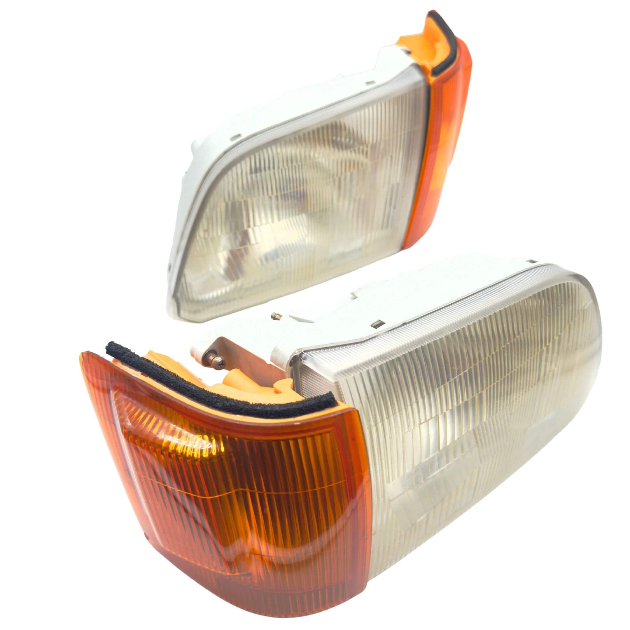 Headlight and Turn Signal Assembly Set for Subaru Sambar Van TV1, TV2 Models (1999-2012) featuring clear lenses and amber accents.