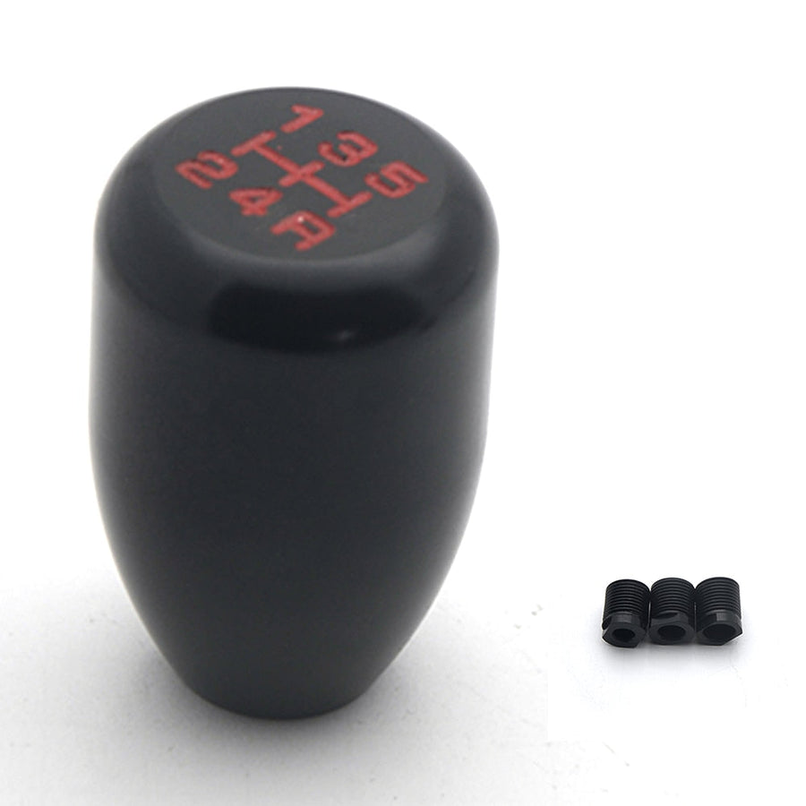 Sleek black shift knob with red lettering, featuring three threaded adapters on a white background for easy installation