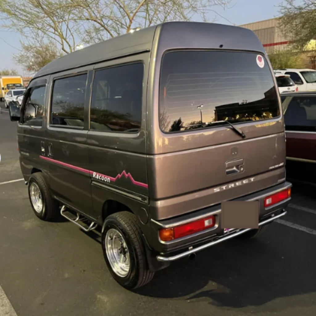 1990s Honda Street Van HH3/HH4 model adorned with Racoon pink side decal, showcasing custom style and design.